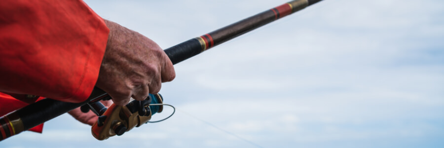 Older man with fishing pole