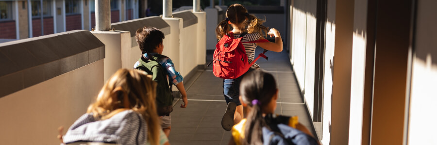 Elementary Students running to class